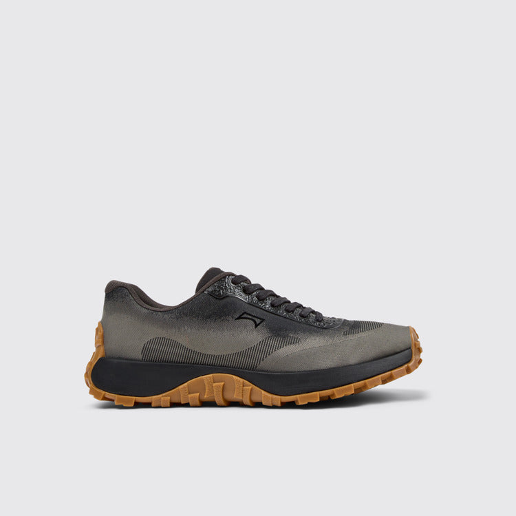Side view of Drift Trail Black and Gray Recycled Engineered Materials and Leather Sneakers for Men.