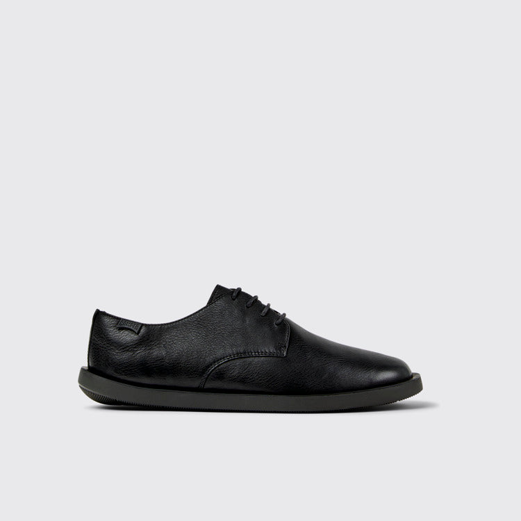 Side view of Wagon Black Leather Shoes for Men.