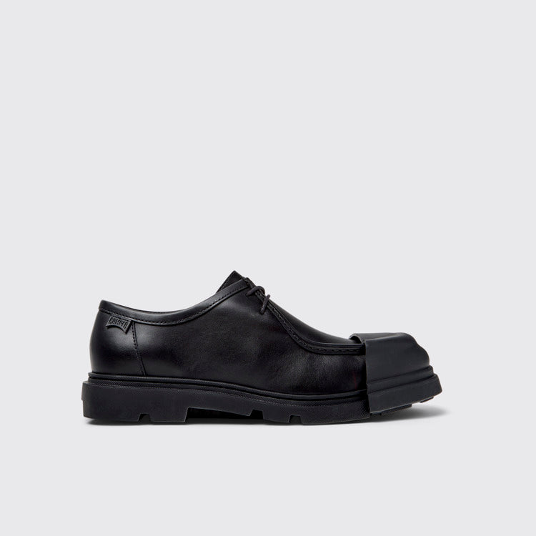 Side view of Junction Black Leather Shoes for Men.