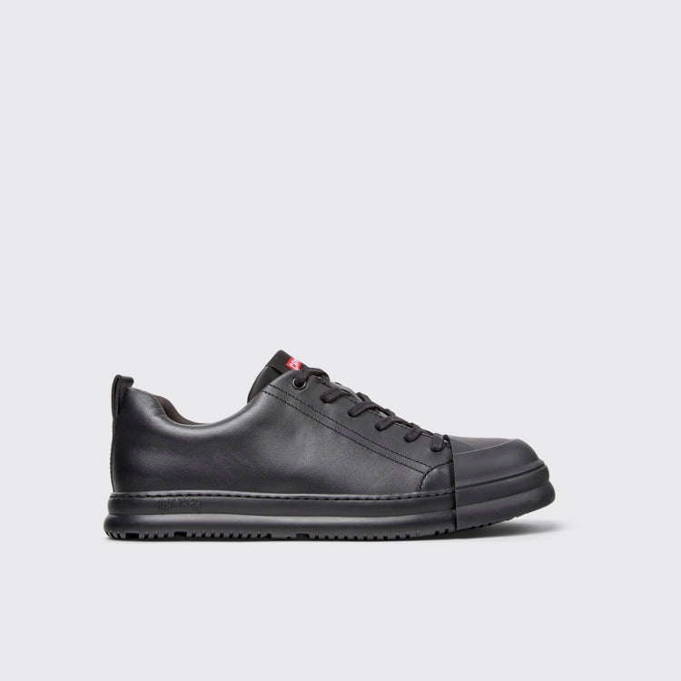 Side view of Junction Runner Black Leather Sneakers for Men.