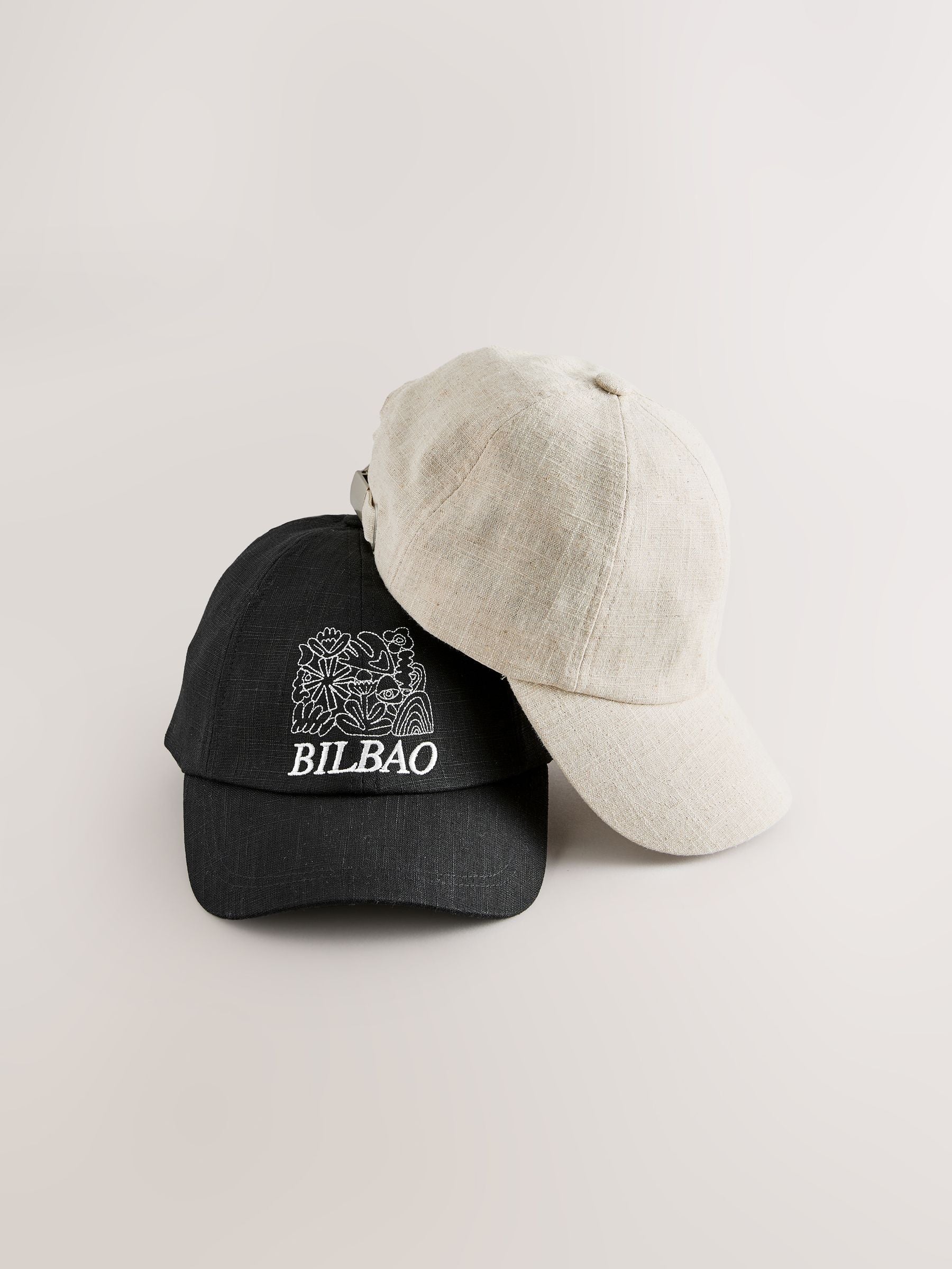 Next Black Cream Caps 2 Pack Adjustable Strap Curved Peak